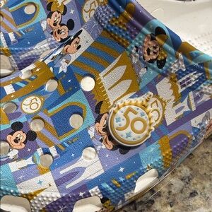 CROCS Mickey 50th Anniversary Patterned Clogs in White, Blue, Gold, Purple
